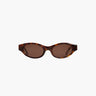 Sunglasses with tortoiseshell frame and brown lenses on a white background