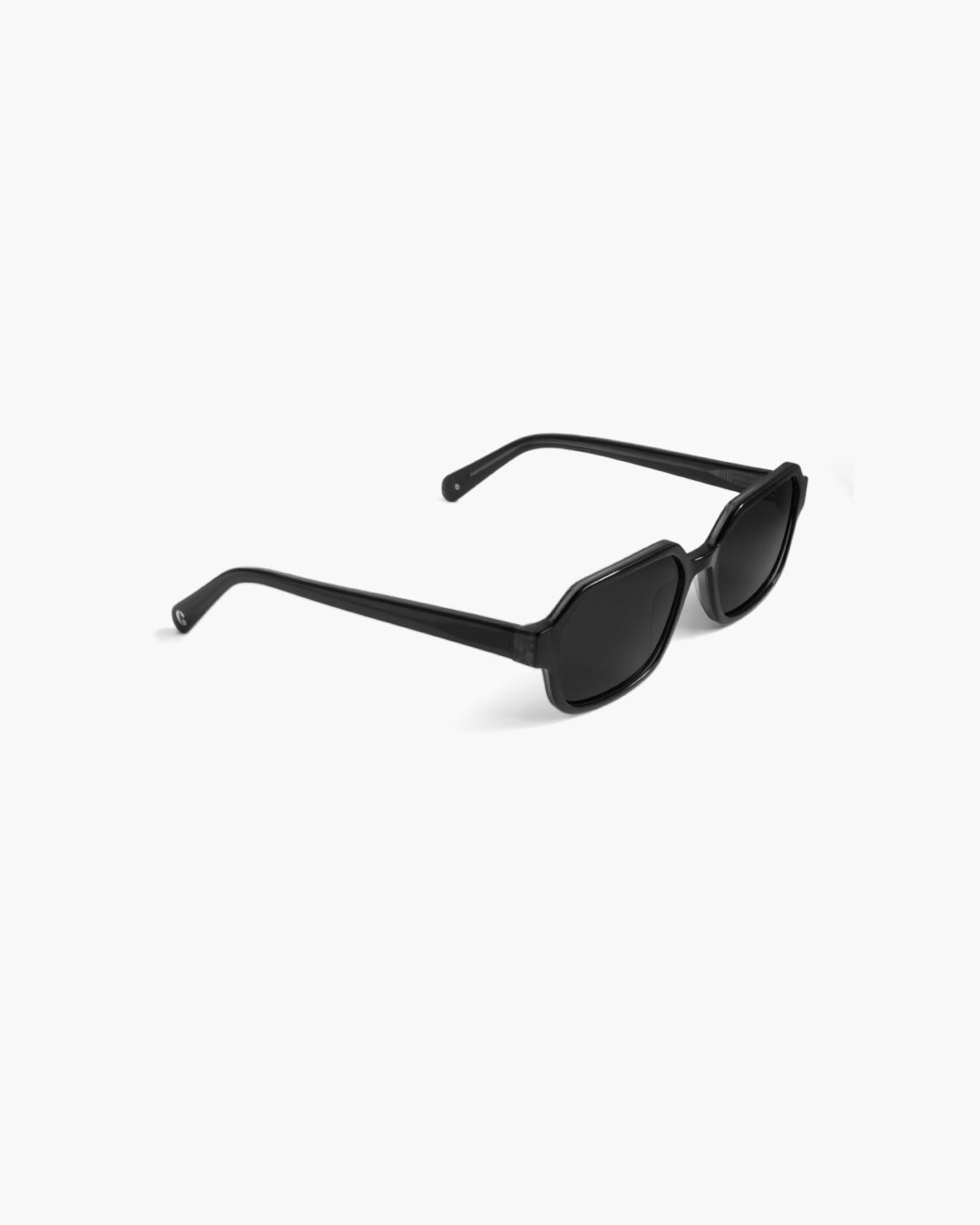 Black sunglasses on a white background slightly from the side