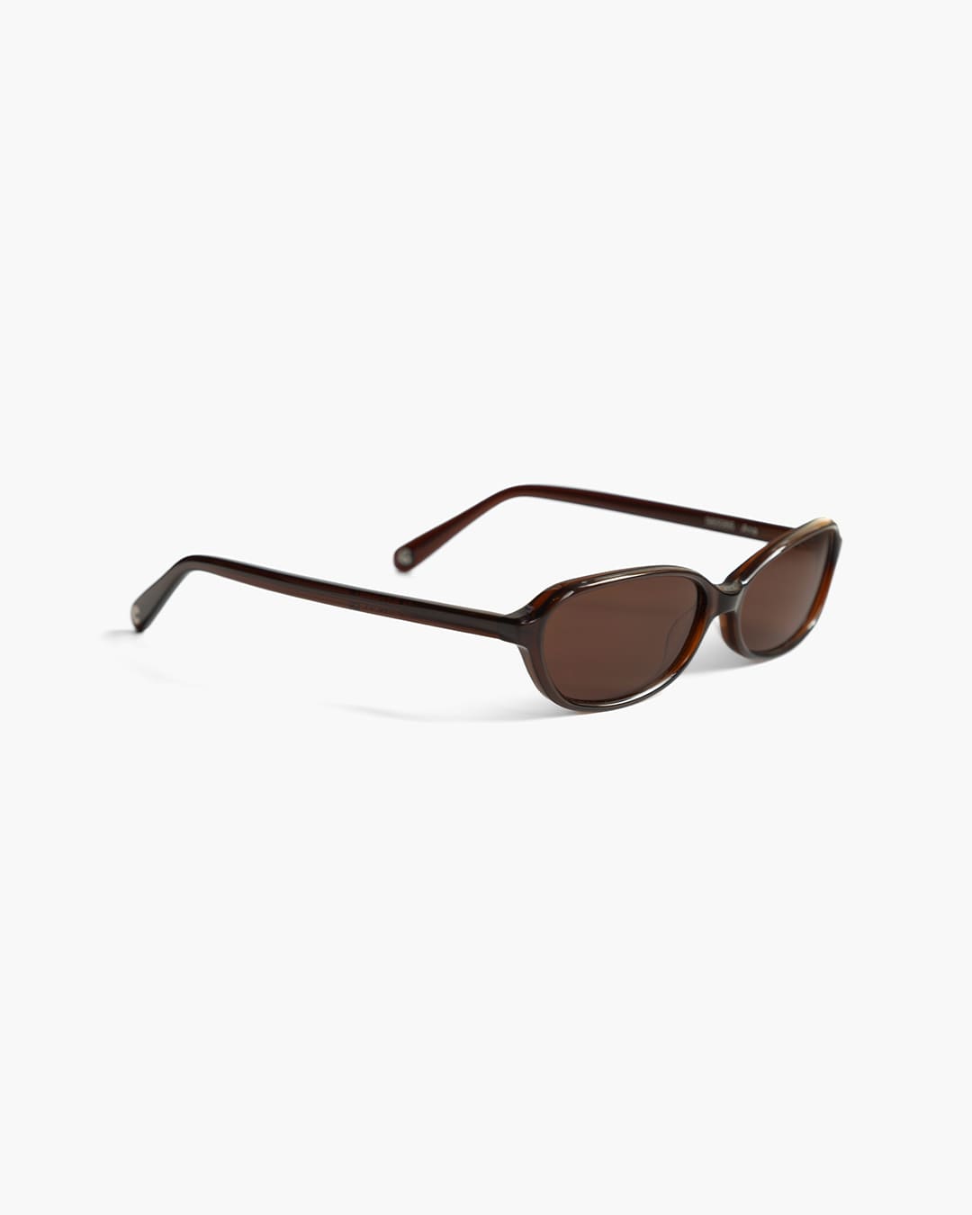 Brown sunglasses on a white background slightly from the side