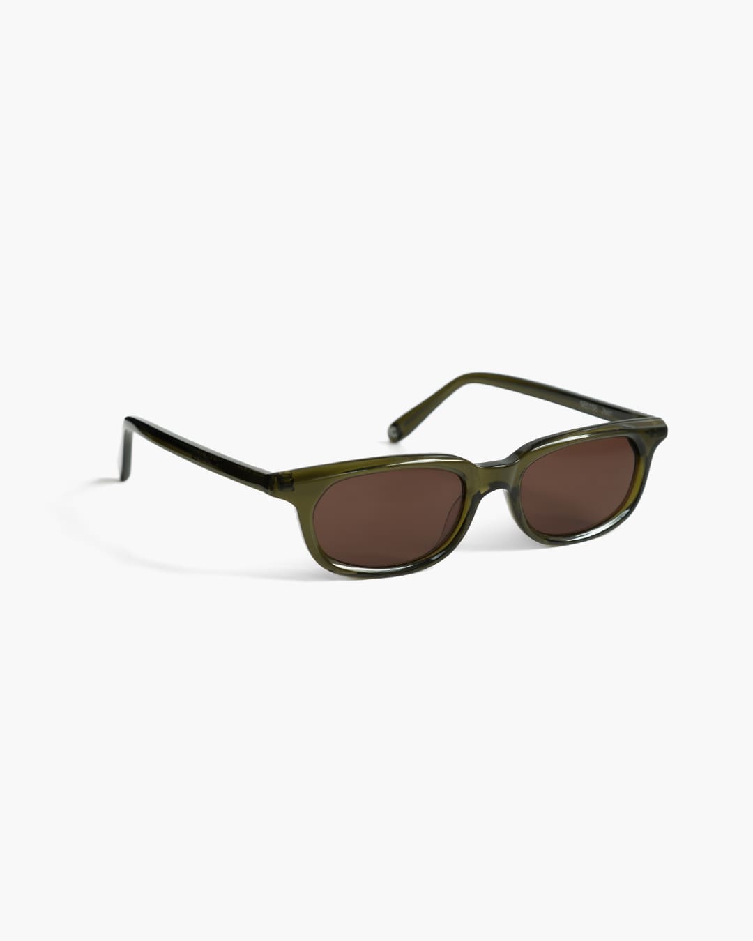 Olive green sunglasses with brown lenses on a white background slightly from the side
