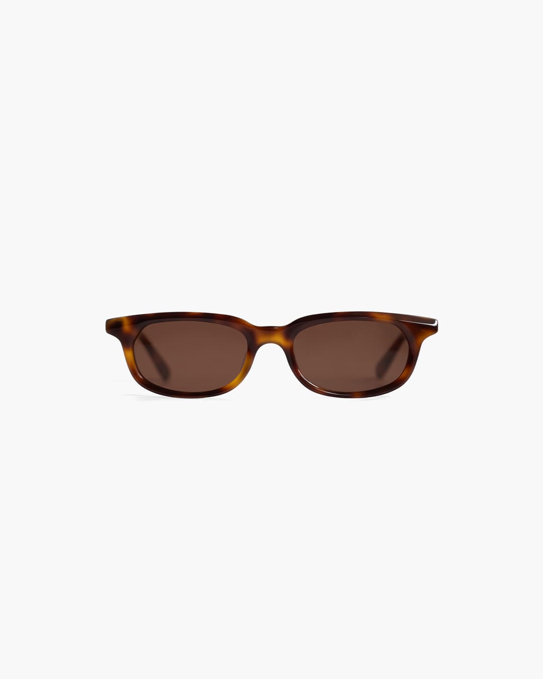 Sunglasses with tortoiseshell frame and brown lenses on a white background