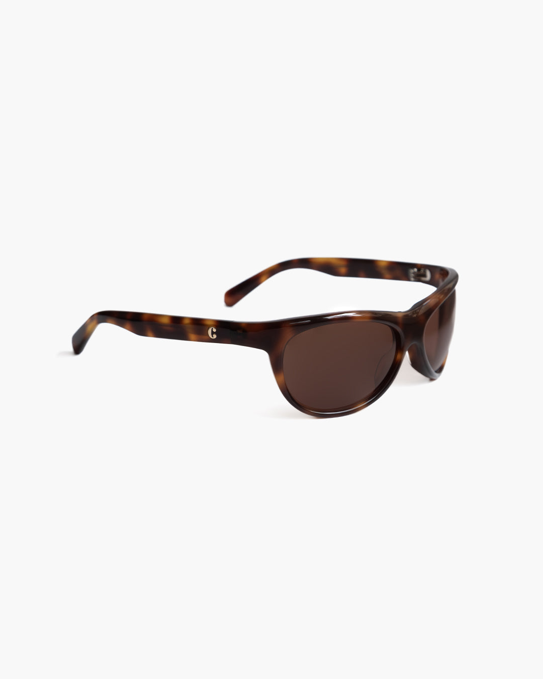 Corlin Eyewear Lynne Tortoise Brown sunglasses — side profile showing German OBE hinges and curved acetate frame