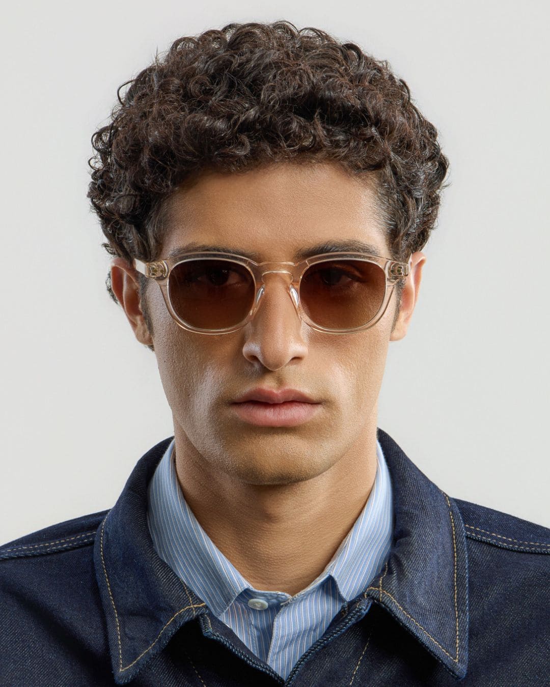 Man wearing Todd Champagne Brown sunglasses by Corlin from the front.